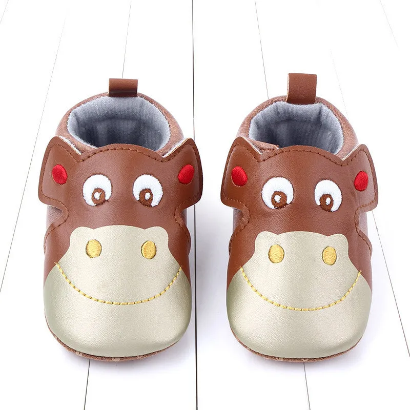 Cartoon pair of velcro toddler shoes