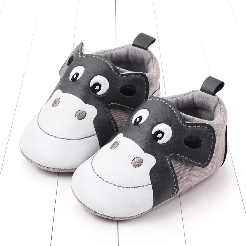 Cartoon pair of velcro toddler shoes