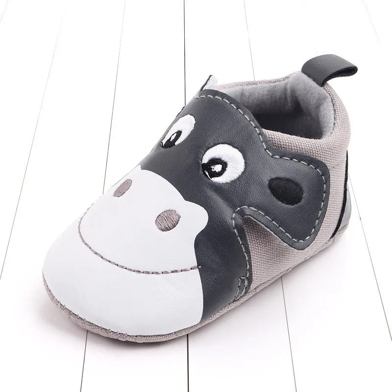 Cartoon pair of velcro toddler shoes