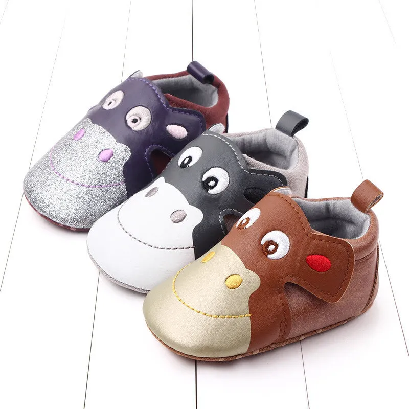 Cartoon pair of velcro toddler shoes